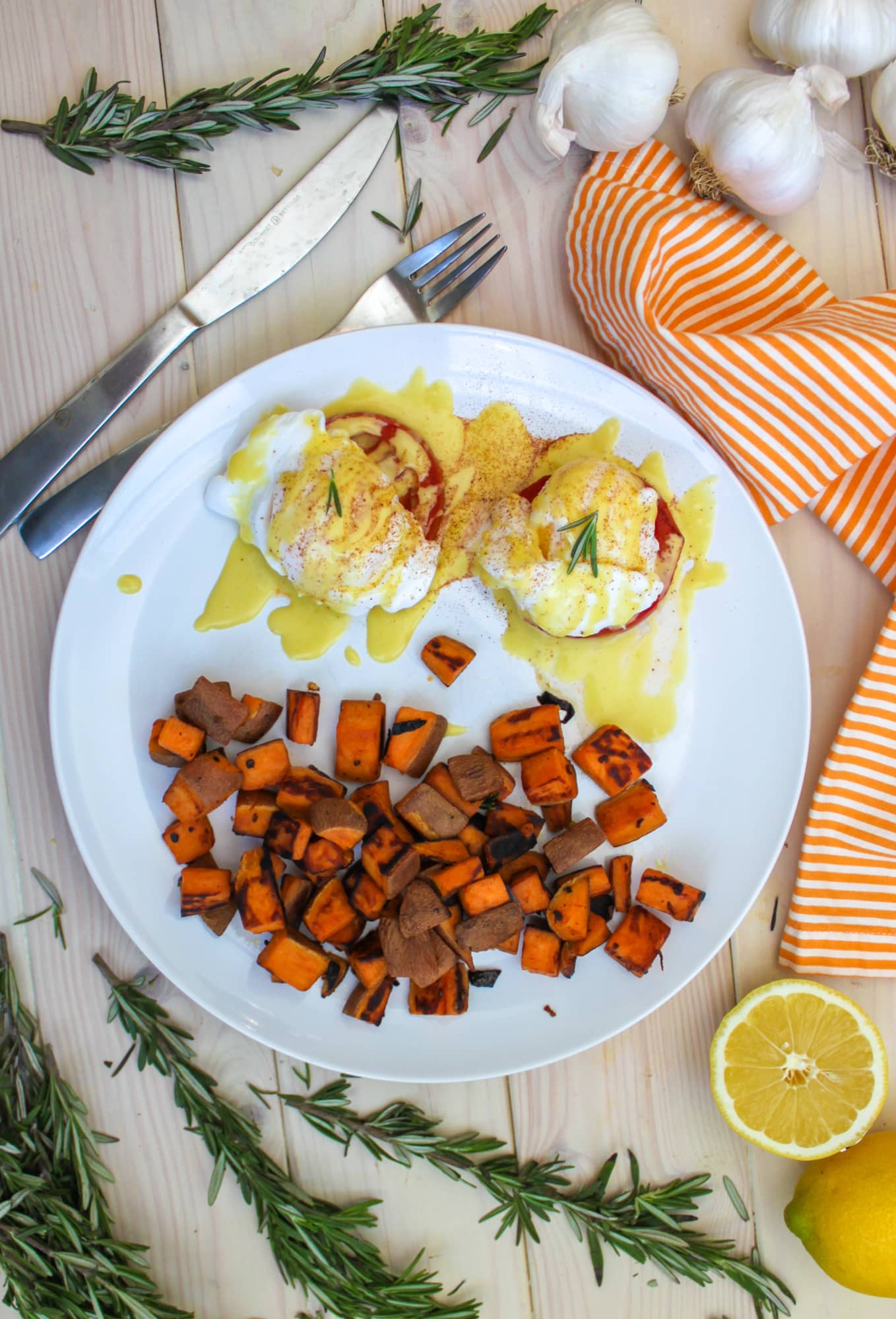 Eggs Benedict with Rosemary Tomatoes, Spicy Sweet Potatoes