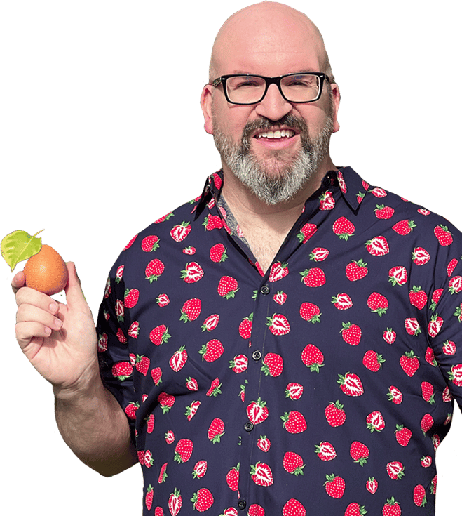 Jerry's smiling holding fruit